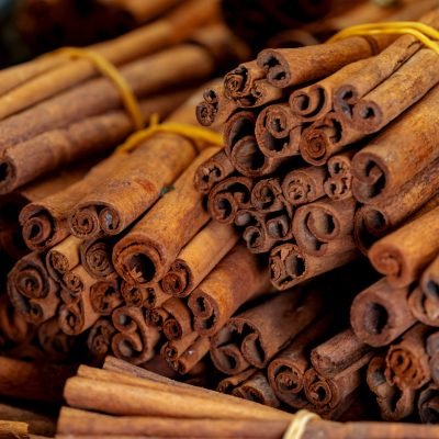 Cinnamon sticks.for sale on stall in market, close up